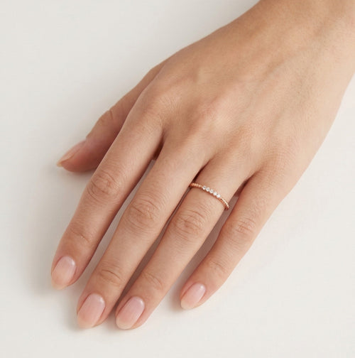 Bague fine torsadée en or rose