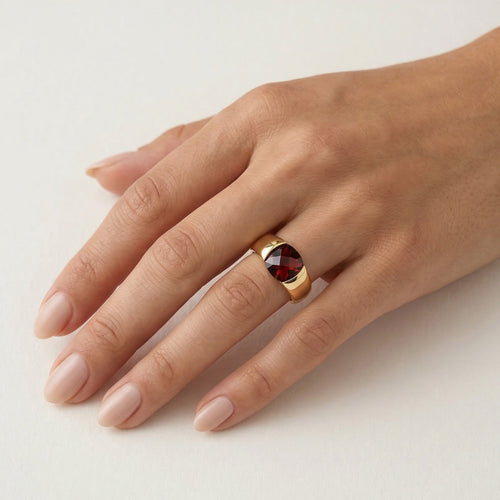 Sophisticated garnet gold gentlemen ring