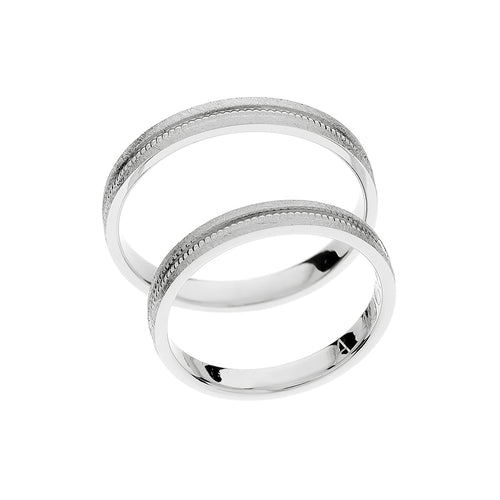 Bague de mariage en or blanc avec un design central unique.