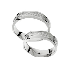 Bague de mariage ronde atypique en or blanc