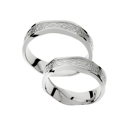 Bague de mariage ronde atypique en or blanc