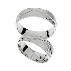 Bague de mariage en or blanc avec lignes gravées