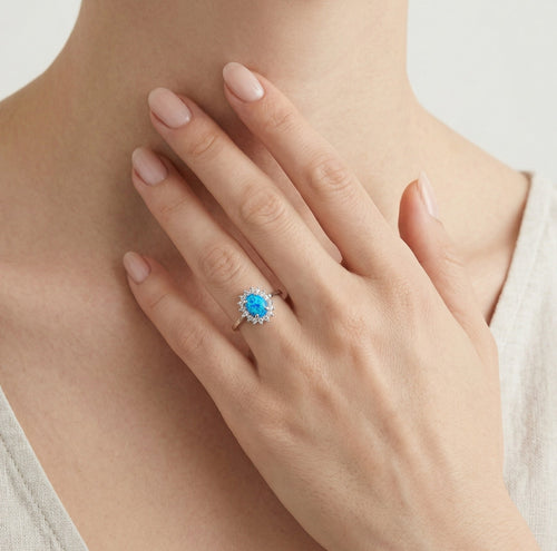 Elegantní dámský stříbrný prsten s modrým opálem