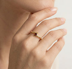 Unique garnet ring with tension setting