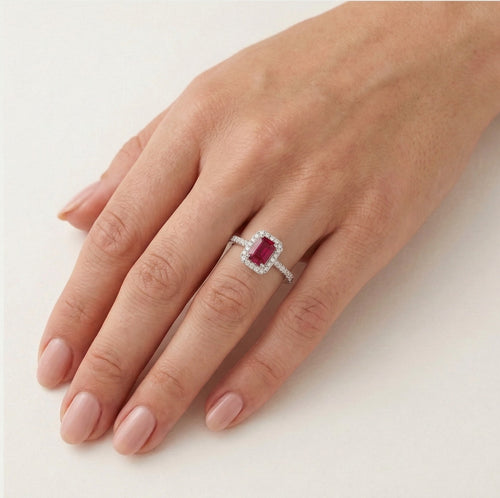 White gold ring with ruby and halo of diamonds