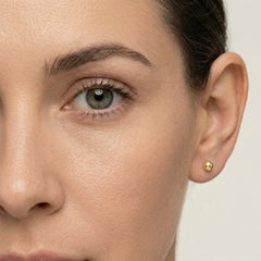 Clous d’oreilles boule en or jaune