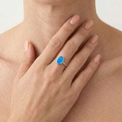 Bague ovale plate en opale bleue