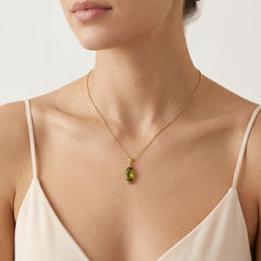 Yellow Gold Pendant with Long Moldavite Stone in Oval Cut