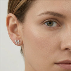 Silver bow stud earrings