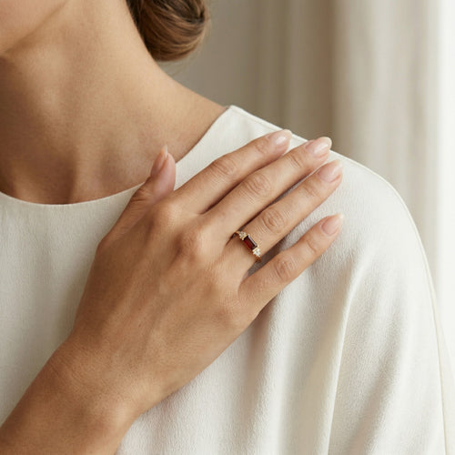 Garnet and cubic zirconia ring in yellow gold
