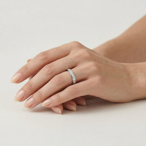 White gold ring with line of diamonds