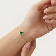 Bracelet en or avec trèfle vert