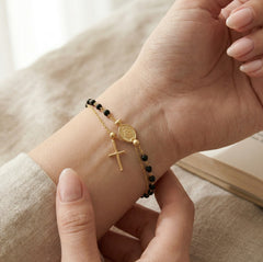 Gold rosary bracelet with onyx