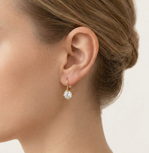 Twisted solitaire gold drop earrings