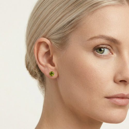 Elegant moldavite and gold stud earrings