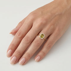 Radiant moldavite and cubic zirconia royal ring