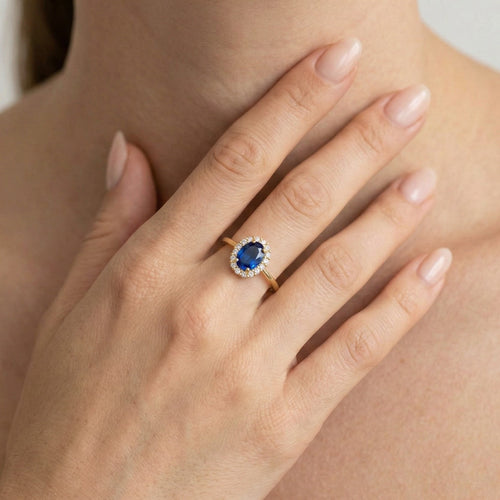 Oválný zlatý prsten se syntetickým safírem