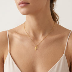 Pendentif en or lettre "F"