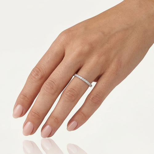 Simple white gold ring with diamonds