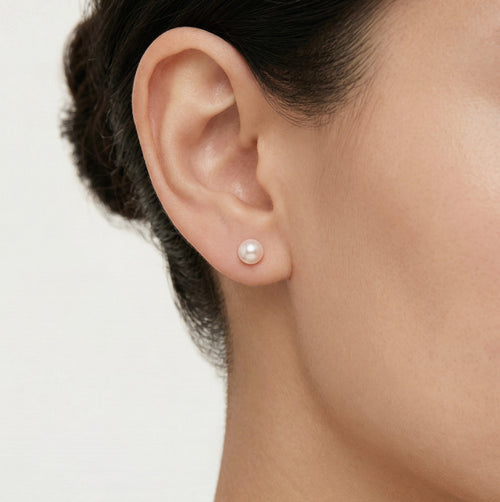 Pendientes de botón de oro blanco con perla blanca