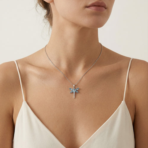 White gold diamond and blue topaz dragon fly pendent