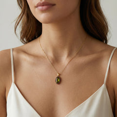 Radiant Fusion Pendant In Yellow Gold With Oval Moldavite And Round Garnet