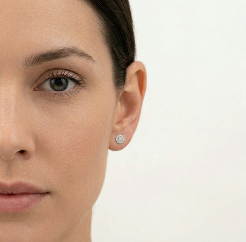 Simple white gold earrings with diamonds