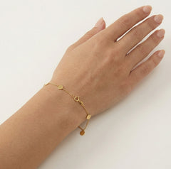 Penízkový náramek ze žlutého zlata