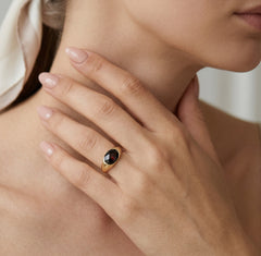 Garnet oval cut ring on bar set