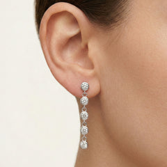 Boucles d’oreilles longues à sertissage clos