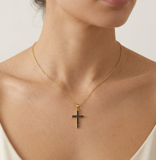 Cruz de oro con circonita cúbica y ónix