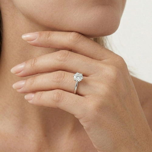 Four prong set silver ring