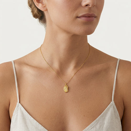 Yellow gold Jesus pendant