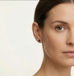 Black onyx and yellow gold clover earrings