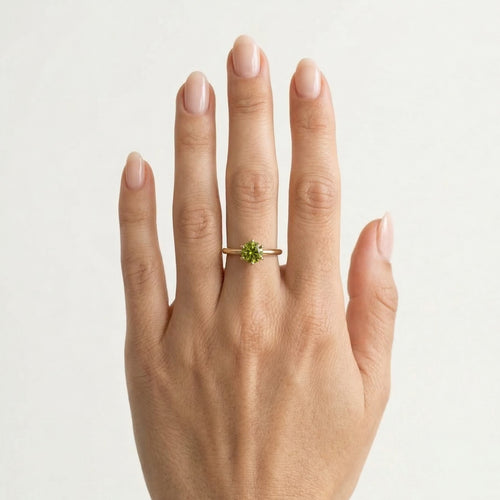 Round moldavite gold elegance