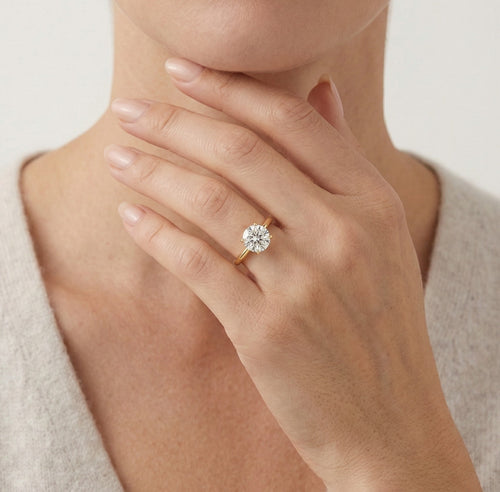 Klasický solitér se čtyřmi kubickými zirkony