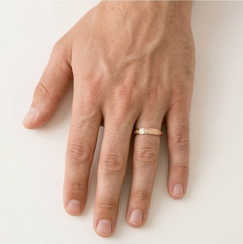 Bague de mariage en or rose avec symboles