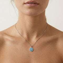 Pendentif boussole en opale bleue