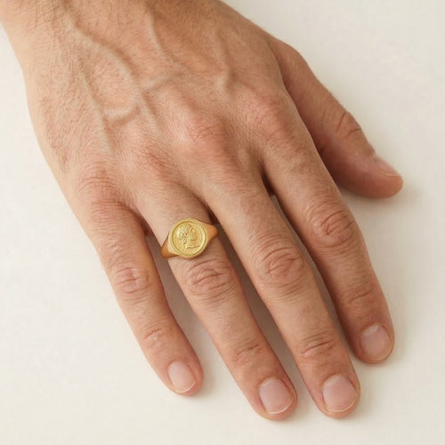 Bague en or avec pièce