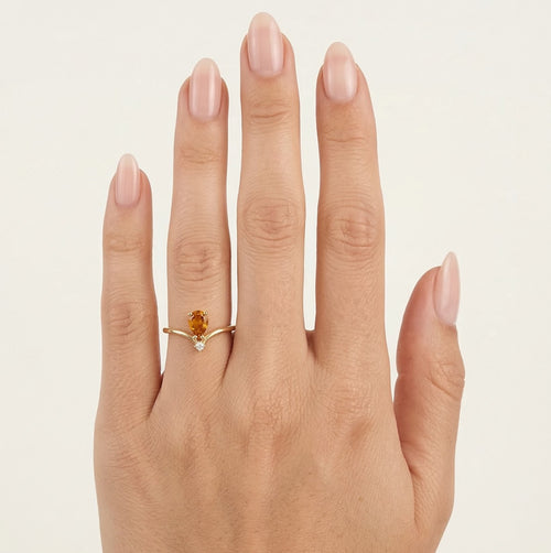 Bague en or avec citrine orange et zircones cubiques