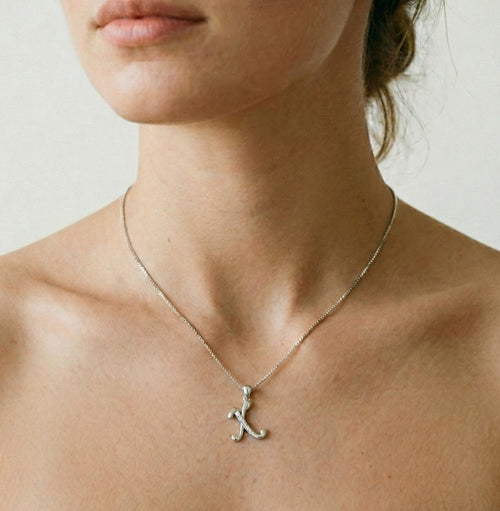 Přívěsek písmena X