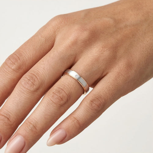 Bague élégante en or blanc et or rose 14 carats