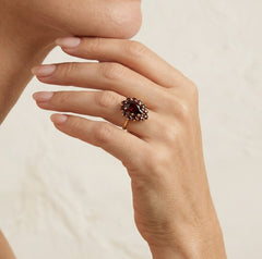 Dazzling duo pear and round garnet ring