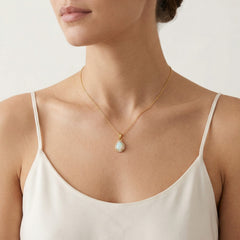 Pear white opal gold pendant