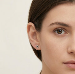 Stylish rose gold earrings with black and white diamonds