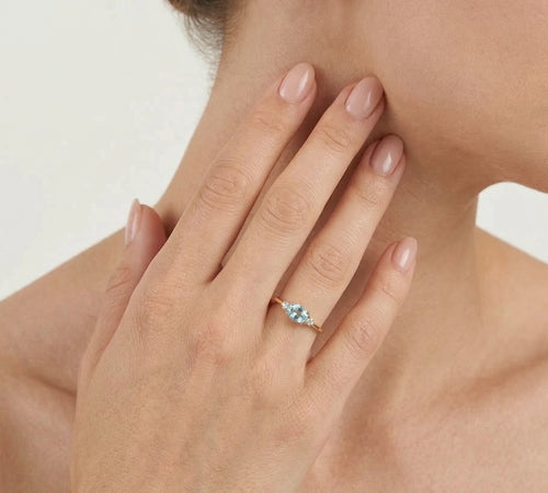 Dreisteinring aus Gelbgold mit Topas und Zirkonia