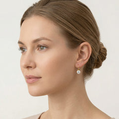 Zlaté kroucené náušnice solitér