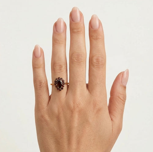 Dazzling duo pear and round garnet ring