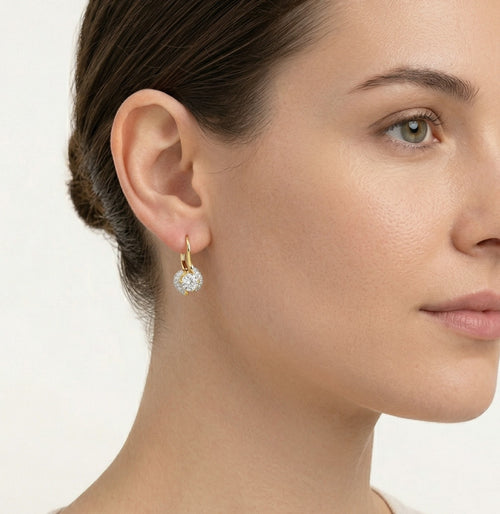 Twisted gold and cubic zirconia earrings