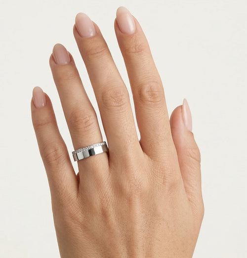 Snubní prsteny z bílého zlata s kameny na okraji